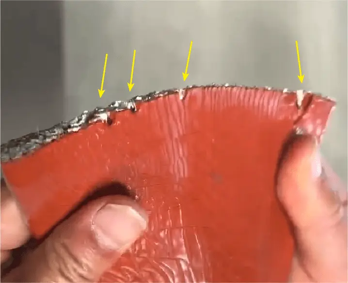 Market firesleeve showing coating delamination after heat test